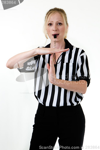 Image of Woman referee with whistle