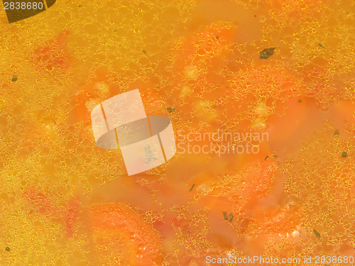 Image of Close-up view on a soup with carrots and sorghum