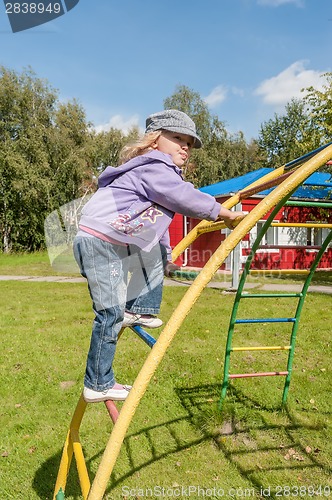 Image of Playful girl on stair