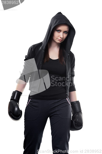 Image of Young woman in boxing gloves on a white background