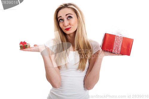 Image of Female model carrying presents