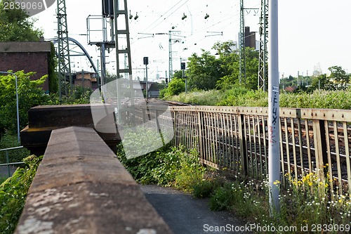 Image of Empty railroad tracks on scale bridge