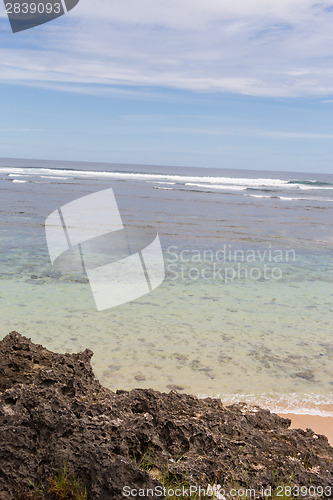 Image of Beautiful tropical beach with lush vegetation