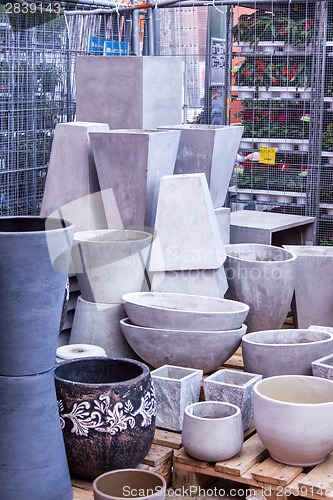 Image of Glazed and unglazed ceramic flower pots