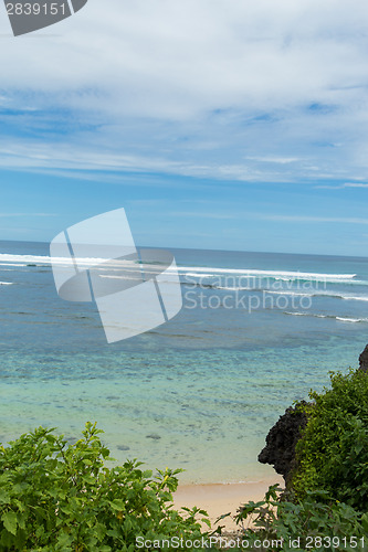 Image of Beautiful tropical beach with lush vegetation