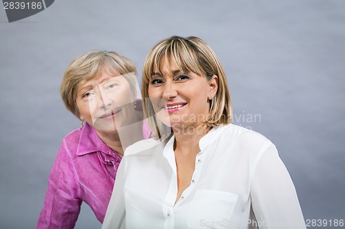 Image of Senior lady with her middle-aged daughter