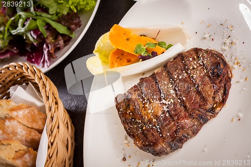 Image of Grilled beef steak with seasoning