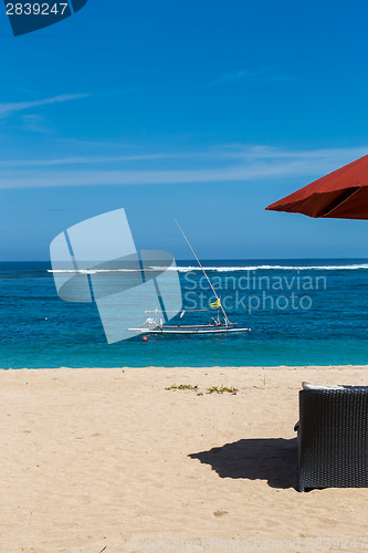 Image of Beach umbrellas on a beautiful beach in Bali