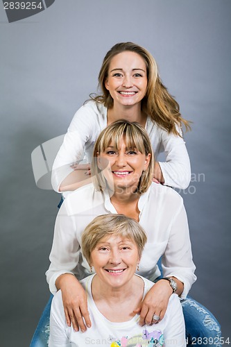 Image of Three generations with a striking resemblance