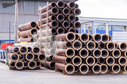 Image of Plastic pipes in a factory or warehouse yard