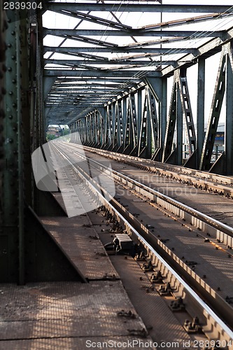 Image of Empty railroad tracks on scale bridge