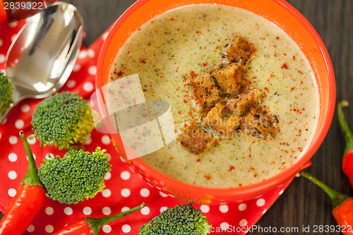 Image of Bowl of chili pepper and broccoli soup