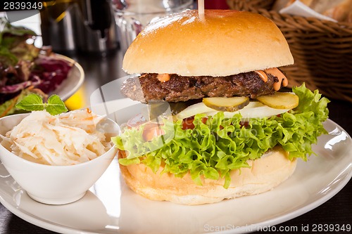 Image of Cheeseburger with cole slaw 