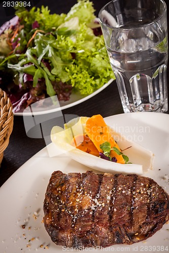 Image of Grilled beef steak with seasoning