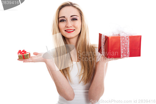 Image of Female model carrying presents