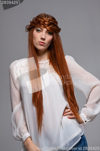 Image of Female model with hand on waist