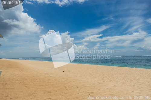 Image of Beautiful tropical beach with lush vegetation