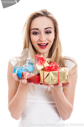 Image of Female model carrying presents