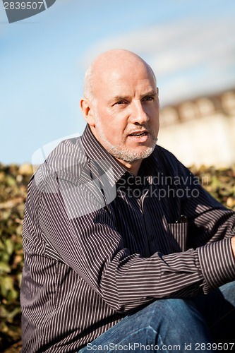 Image of Stylish man in sunglasses enjoying the sun