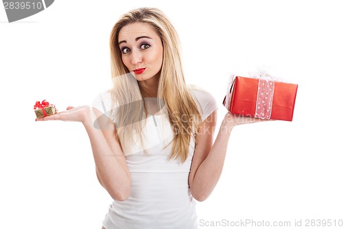 Image of Female model carrying presents