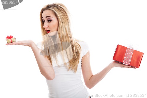 Image of Female model carrying presents
