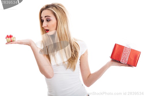 Image of Female model carrying presents