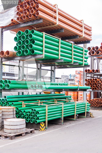 Image of Plastic pipes in a factory or warehouse yard