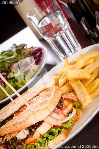 Image of Club sandwich with potato French fries