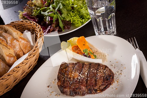 Image of Grilled beef steak with seasoning