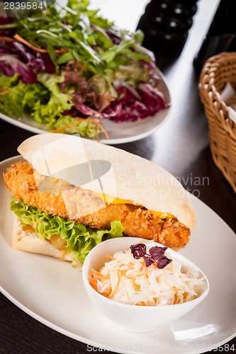 Image of Burger with golden crumbed chicken breast