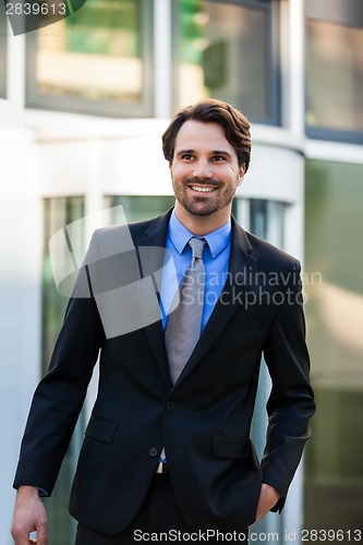 Image of Businessman standing waiting for someone