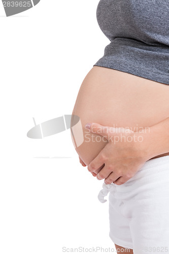 Image of Happy beautiful young pregnant woman