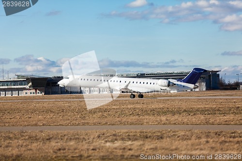 Image of Passenger airliner taking off at an airport