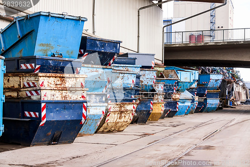 Image of Rows of empty garbage tips