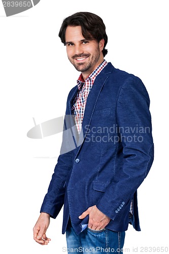 Image of Handsome smiling man approaching the camera