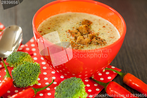 Image of Bowl of chili pepper and broccoli soup