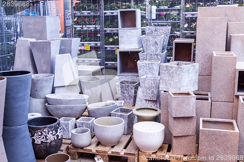 Image of Glazed and unglazed ceramic flower pots