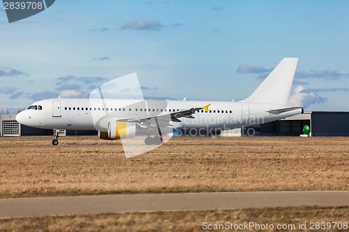 Image of Passenger airliner taking off at an airport