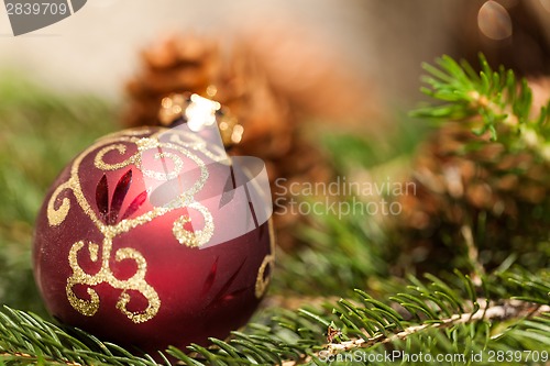 Image of Red Christmas balls with pine cones