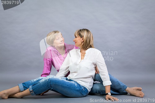 Image of Senior lady with her middle-aged daughter