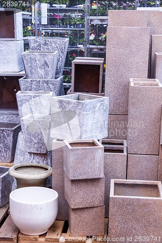 Image of Glazed and unglazed ceramic flower pots