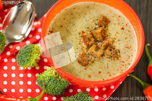 Image of Bowl of chili pepper and broccoli soup