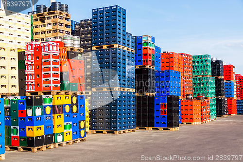 Image of Stacks of beverage bottle crates