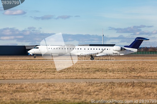 Image of Passenger airliner taking off at an airport