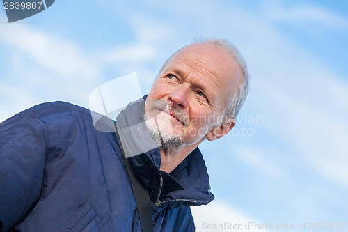 Image of Senior man with a thoughtful expression