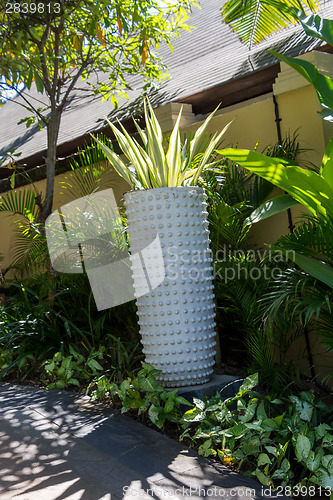 Image of Ornate column in formal Balinese garden