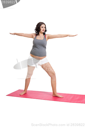 Image of Pregnant woman doing aerobics exercises