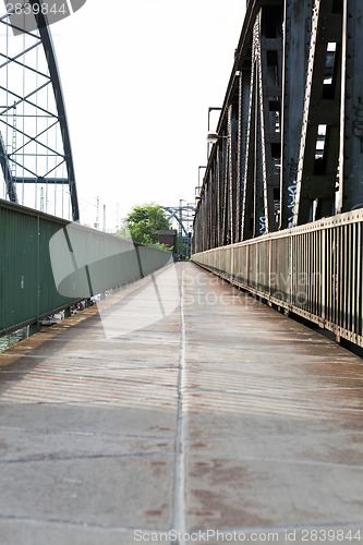 Image of Empty railroad tracks on scale bridge