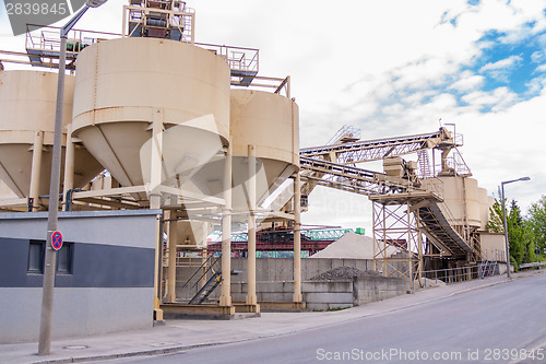 Image of Metal tanks at a refinery plant or factory