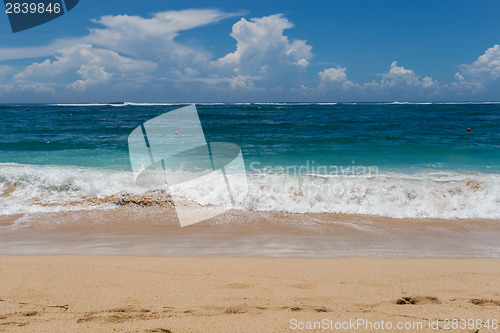 Image of Beautiful tropical beach with lush vegetation